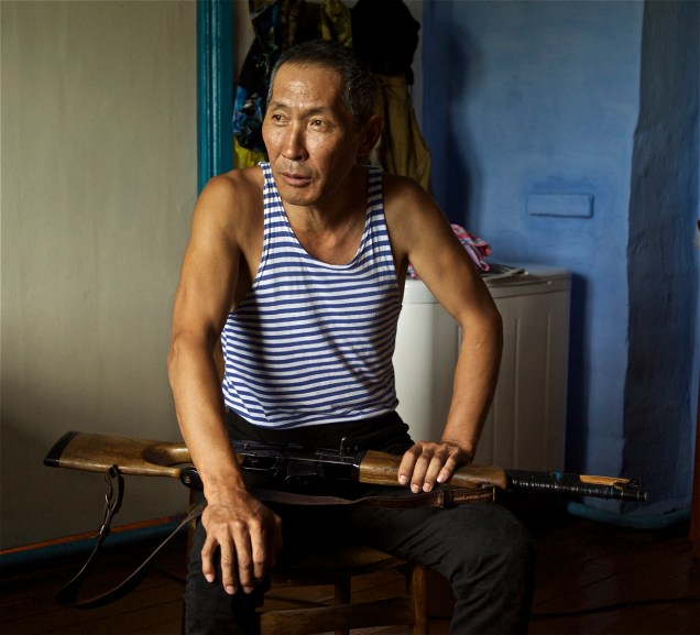 An Udegeh hunter with his rifle