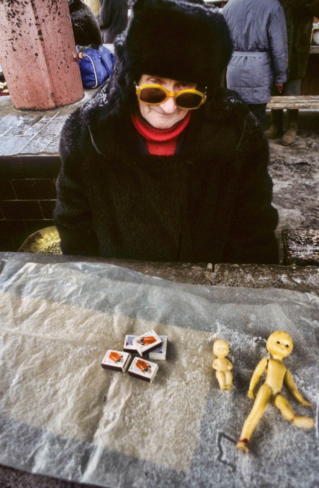 Man selling dolls small